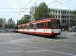Eine Doppeltraktion aus Stadtbahnwagen B der KVB ist am 14.06.2004 auf dem Barbarossaplatz in Kln unterwegs.