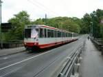 Eine Doppeltraktion aus Stadtbahnwagen B ist am 08.05.2004 auf der Margarethenbrcke in Essen unterwegs.