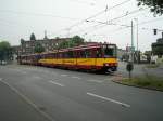 Eine Doppeltraktion aus Stadtbahnwagen B der Rheinbahn ist am 02.06.2004 an der Haltestelle  Kulturstrae  in Duisburg unterwegs.