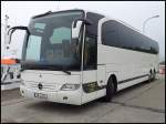 Mercedes Travego von Langreder Reisen aus Deutschland im Stadthafen Sassnitz.