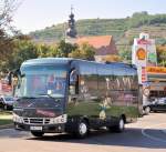 ISUZU  Harmony  Kleinbus von WALTER Reisen aus �sterreich im September 2013 in Krems unterwegs.